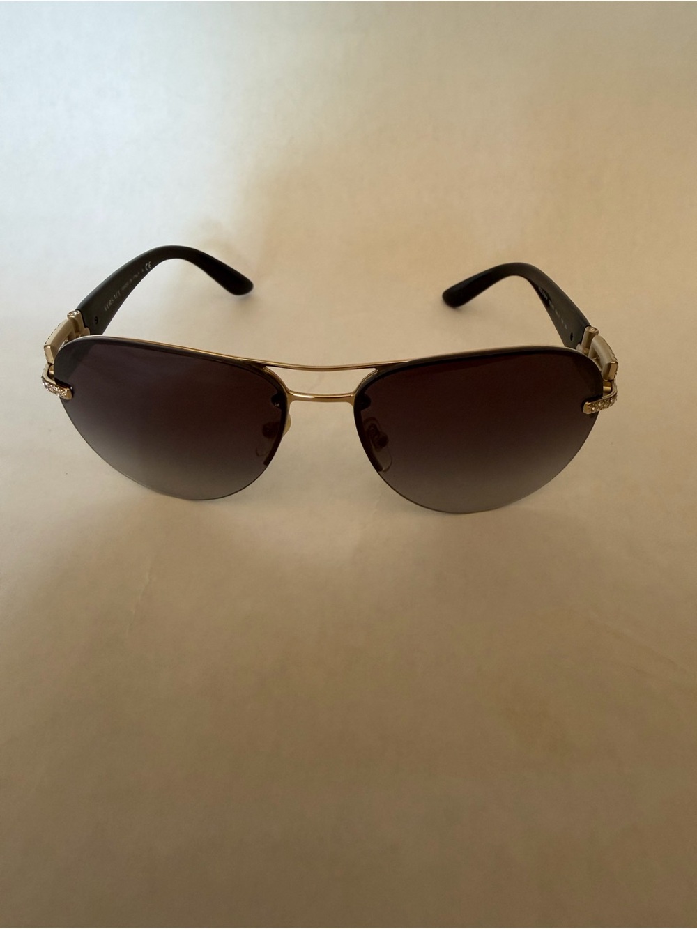 Versace Gold Frame Sunglasses with Brown Gradient Lenses and Black Temples